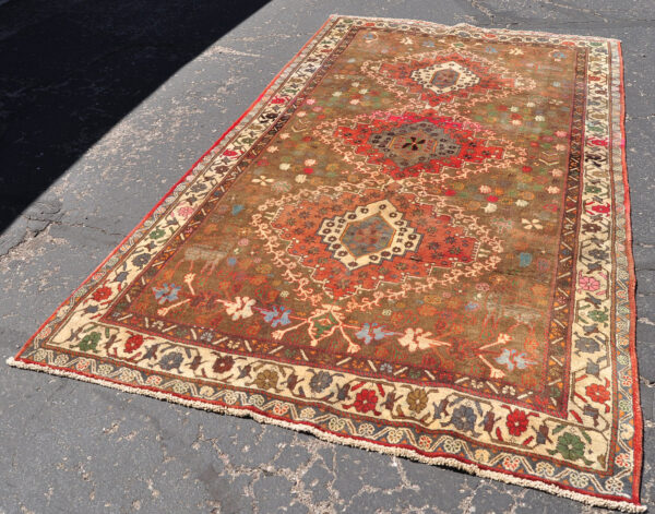 <a class="more-link" href="https://dingo.gallery/product/qashqai-medallion-rug-muted-field-color-deer-10-ft-4-in-by-5-ft-7-in/">Continue Reading →</a> Iran Qashqai Carpet - Goat