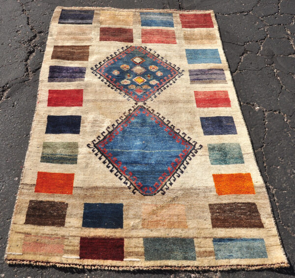 <a class="more-link" href="https://dingo.gallery/product/persian-tribal-gabbeh-rug-with-hooked-medallions-5-ft-5-in-by-3-ft-4-in/">Continue Reading →</a> Iran Persian gabbeh carpet