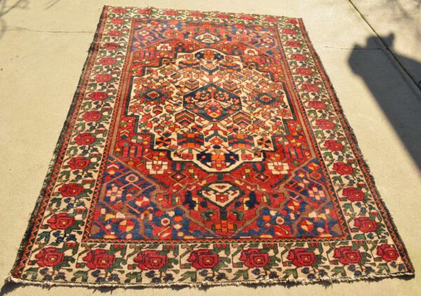 <a class="more-link" href="https://dingo.gallery/product/persian-antique-bakhtiari-tribal-rug-7-ft-by-5-ft/">Continue Reading →</a> Persian Bakhtiari Antique Rose Rug